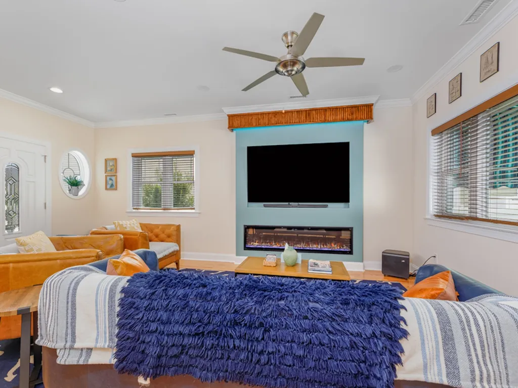 LIVING RM. WITH TV AND ELECTRIC FIREPLACE