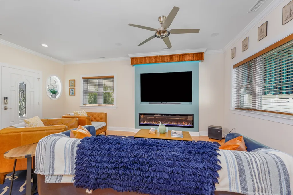 LIVING RM. WITH TV AND ELECTRIC FIREPLACE