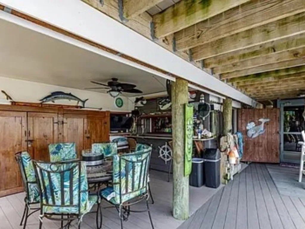Dining next to the outdoor  kitchen