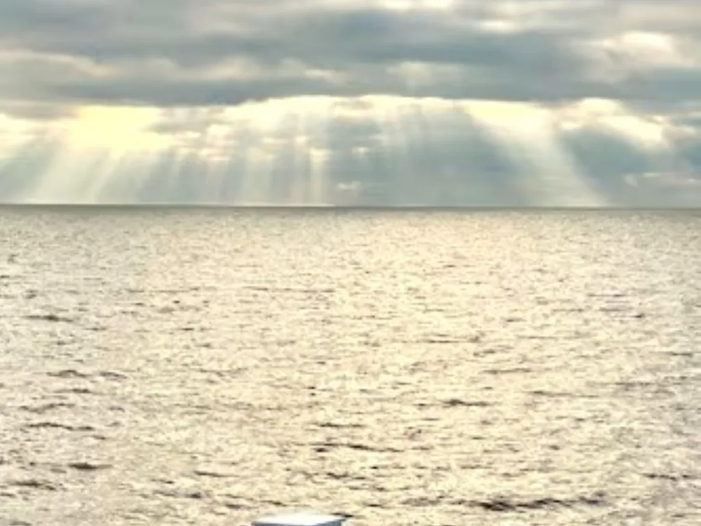 Sun shining through clouds