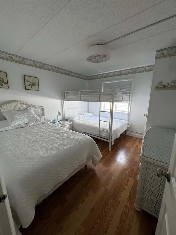 2nd Bedroom has 3 full size beds and smart TV