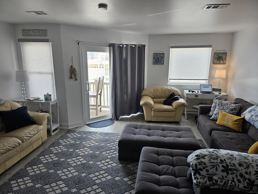 Living room with slider to deck