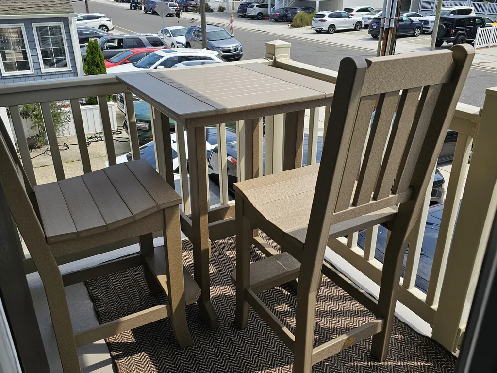 Deck with polyvinyl table and chairs