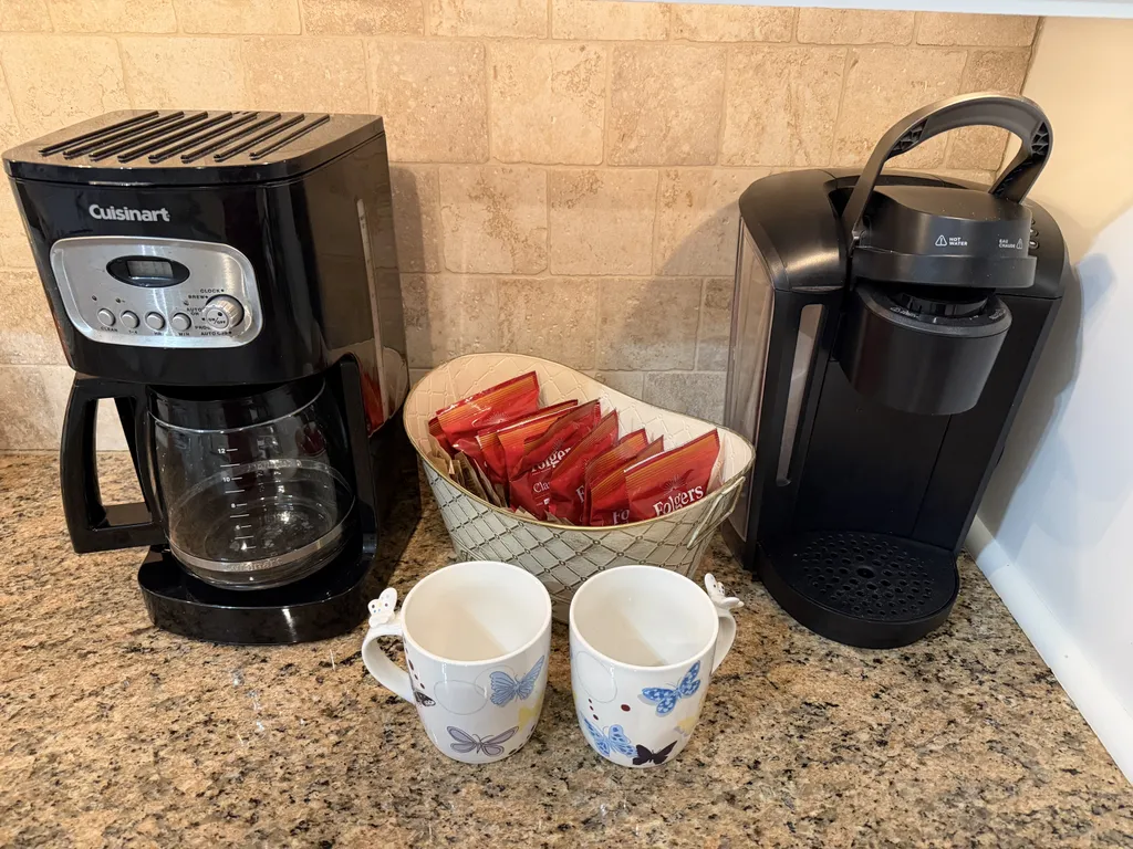 Drip coffee maker and Keurig.  Drip coffee and sugar supplied.