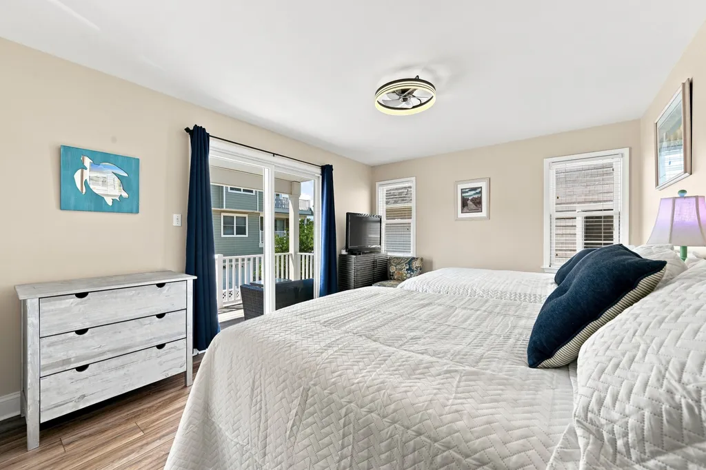 Second floor back bedroom.  1 Queen, 1 Full