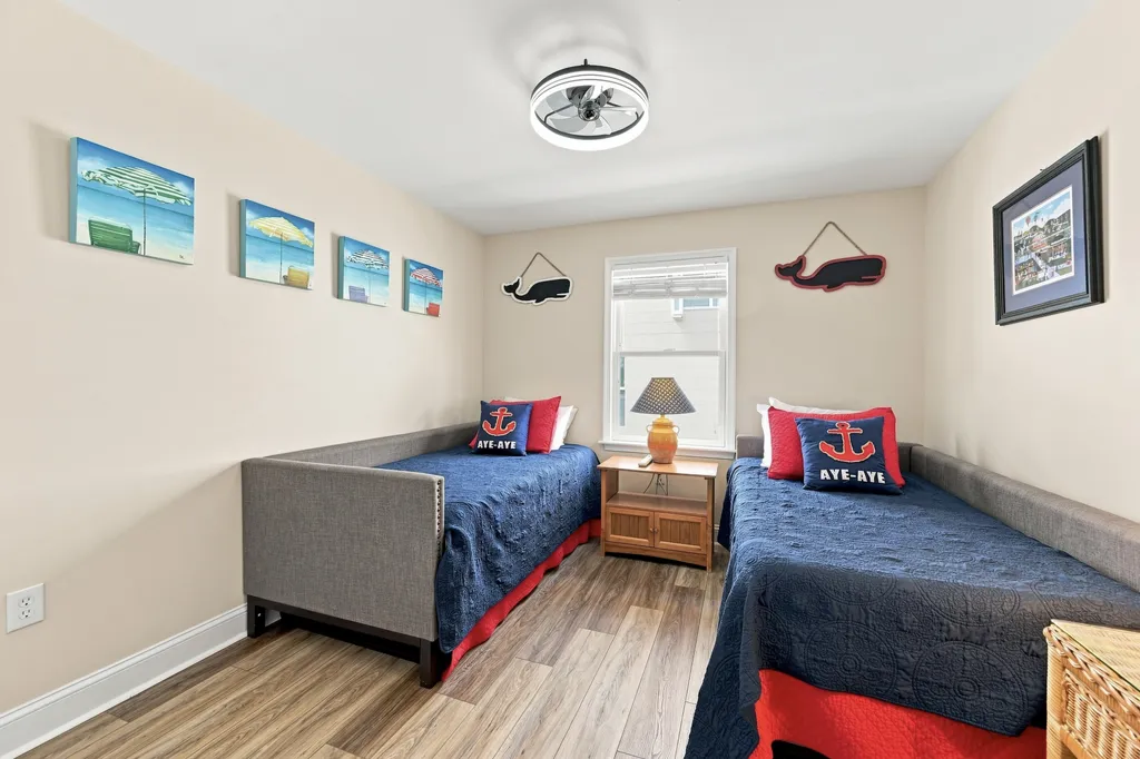 Second floor middle bedroom.  2 Twins.  2 extra twin mattresses with frames.