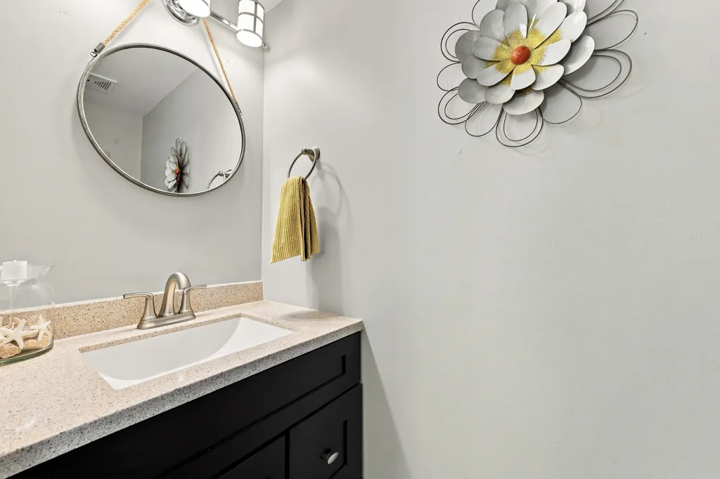 Half bathroom off kitchen.