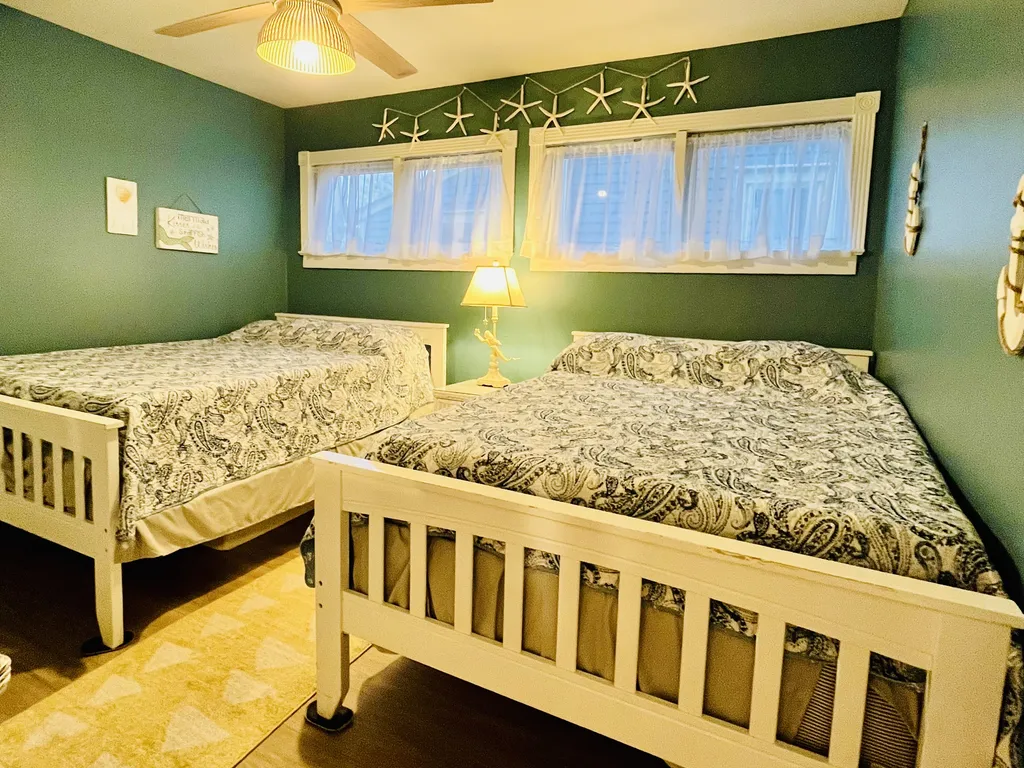 Bedroom with two full size beds