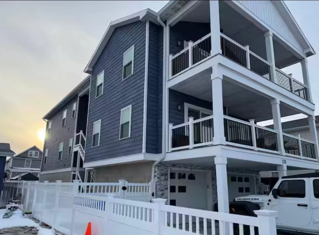 Stairs to entrance on left side of property 