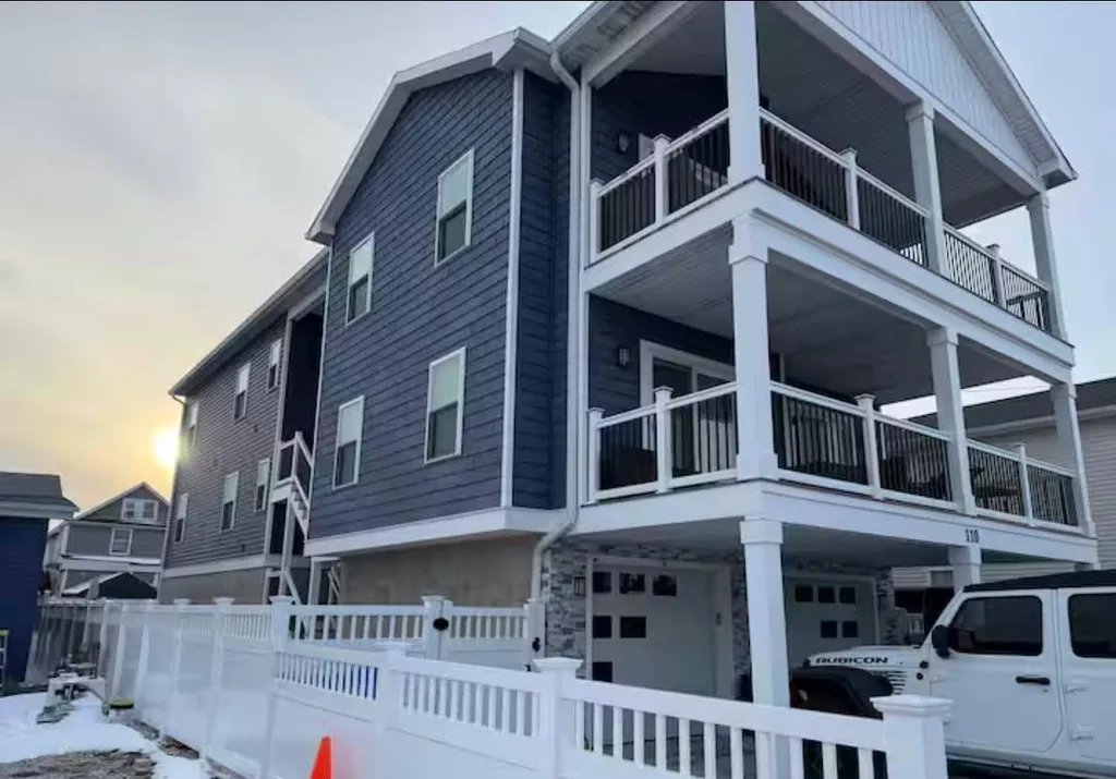 Stairs to entrance on left side of property 