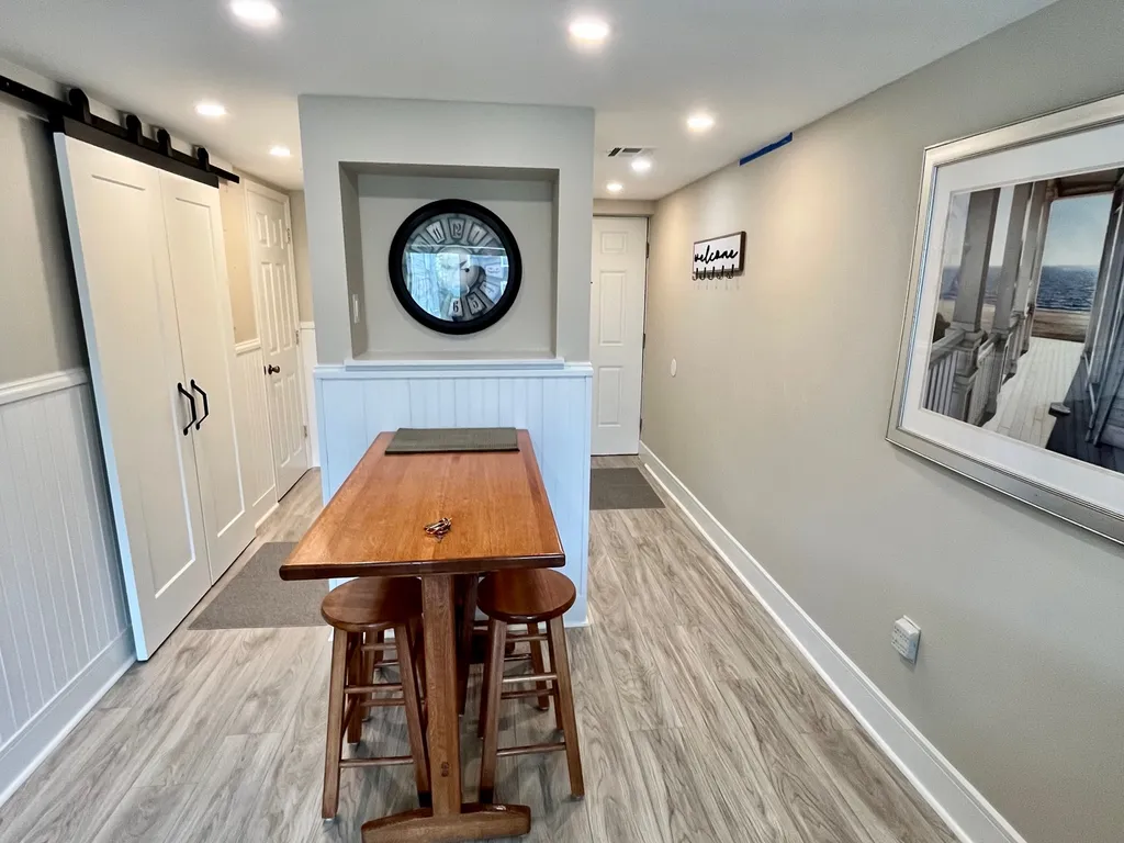 View of Foyer &amp;amp; Bathroom Hallway from Living Room