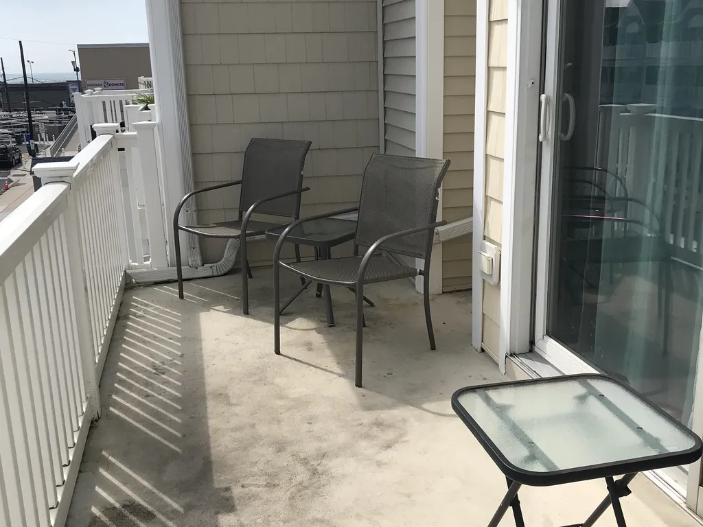 Beach block and steps to the boardwalk ramp