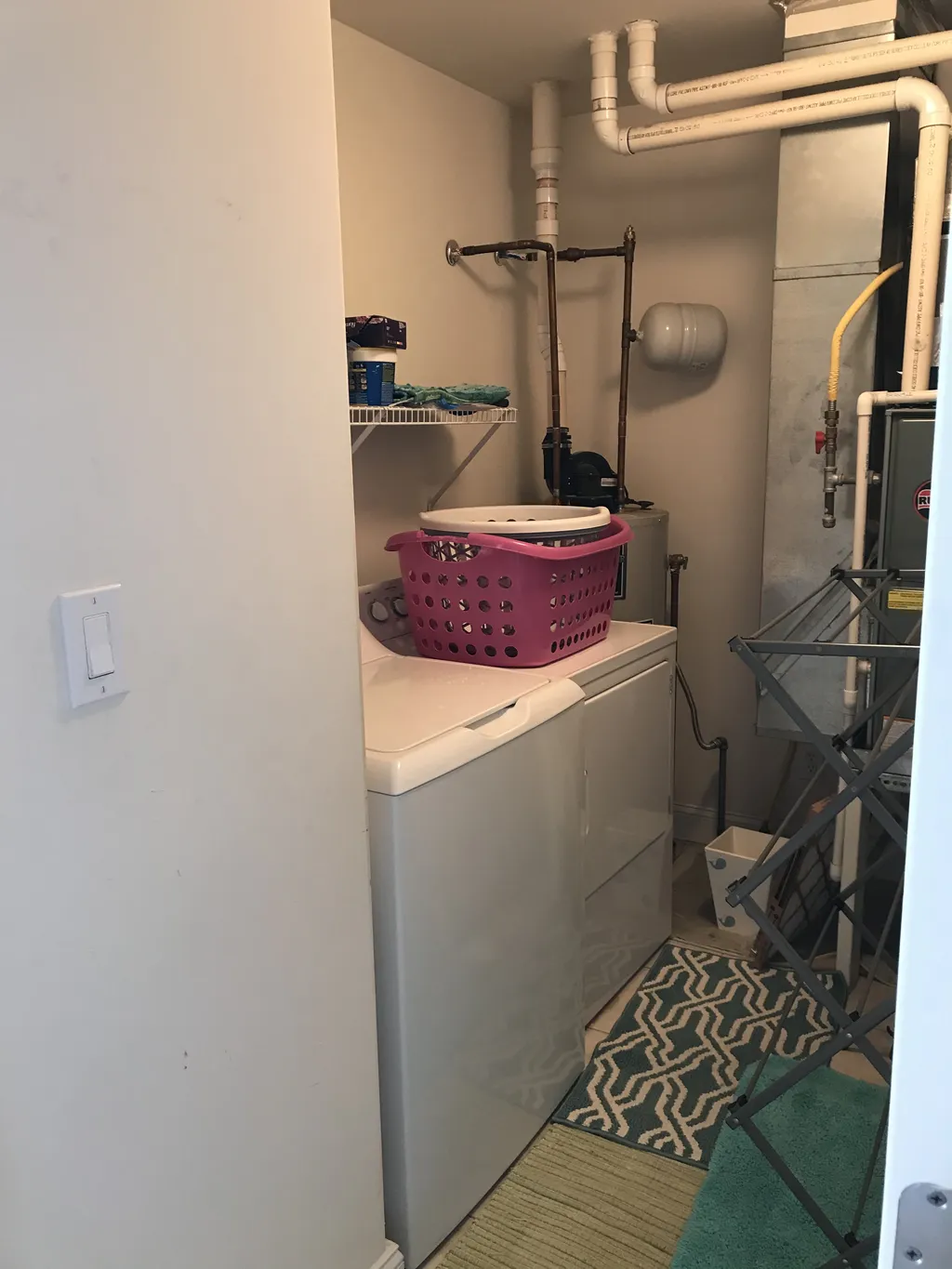 Full size washer and dryer in separate laundry room