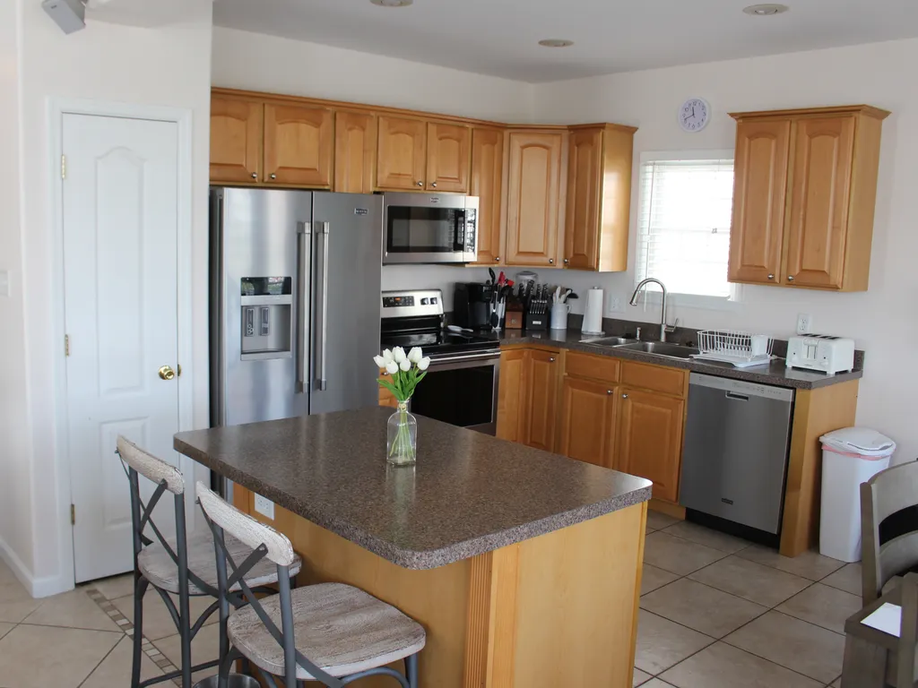 Kitchen with island bar stools