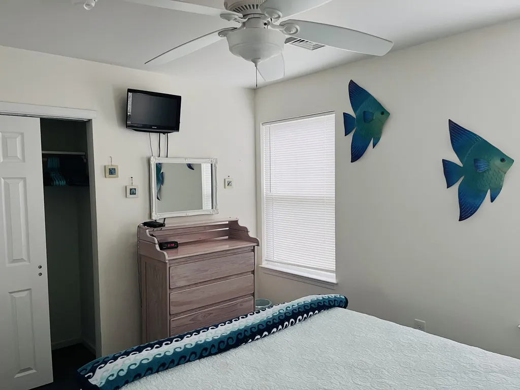 Bedroom 2 -TV, full closet with hangars, dresser