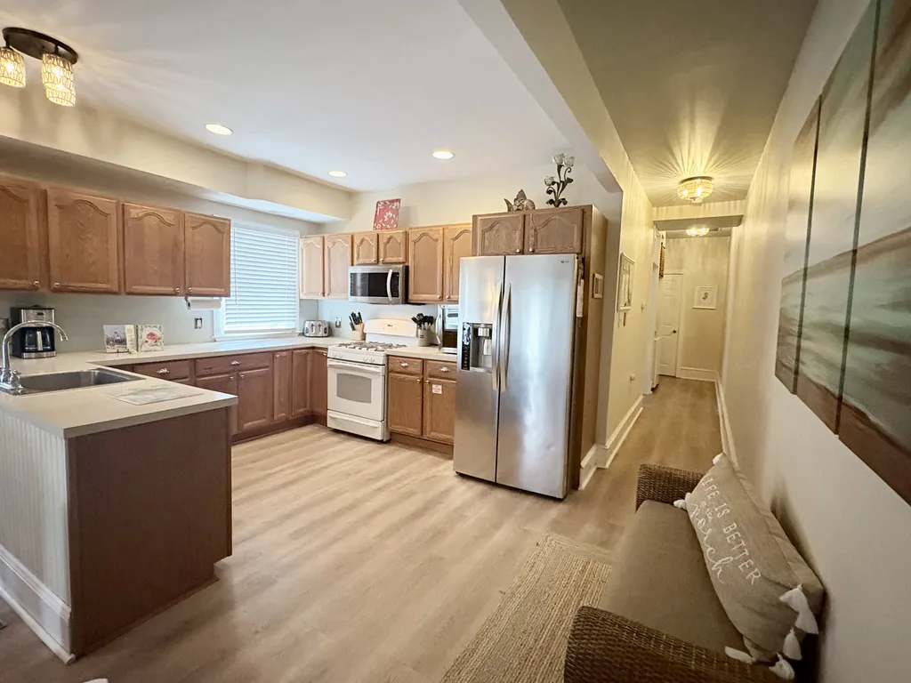 Fully stocked kitchen with wine chiller