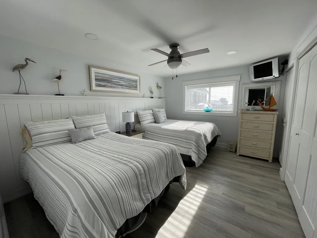 Bedroom with 2 full beds and cool ocean breezes and views
