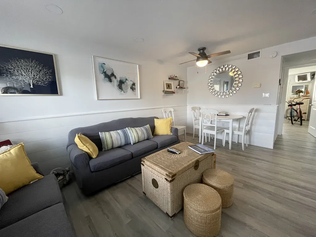 Warm living room with 1 full Lazy boy sleeper sofa.