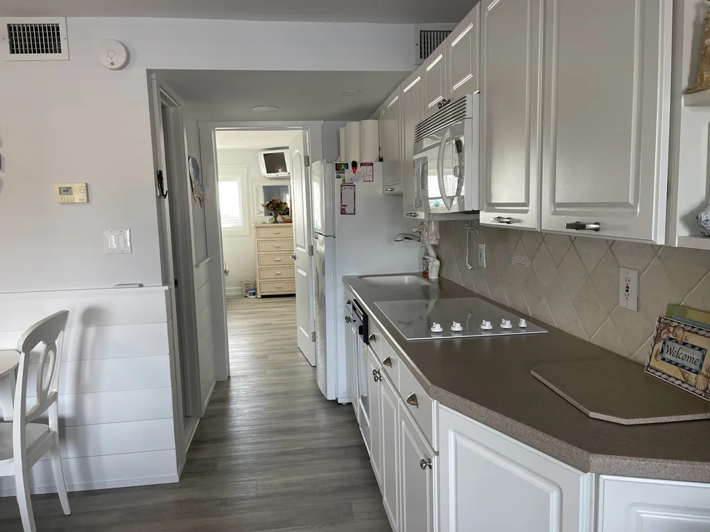 Modern kitchen with stovetop, convection oven/microwave
