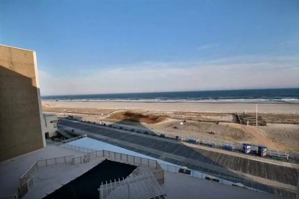 balcony view of beach and pool