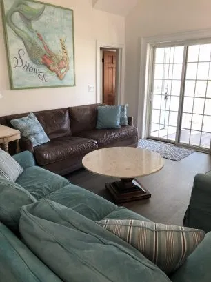 family room with sliders to pool