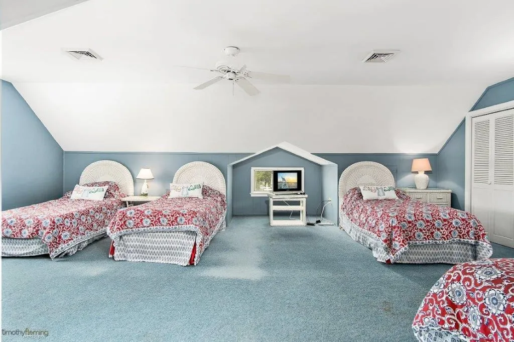 Upstairs bedroom 3 singles and queen