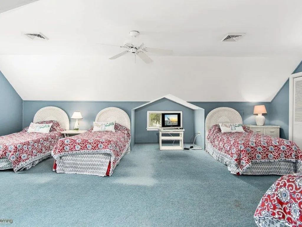 Upstairs bedroom 3 singles and queen