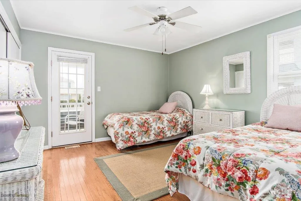 First floor bedroom with shared front deck