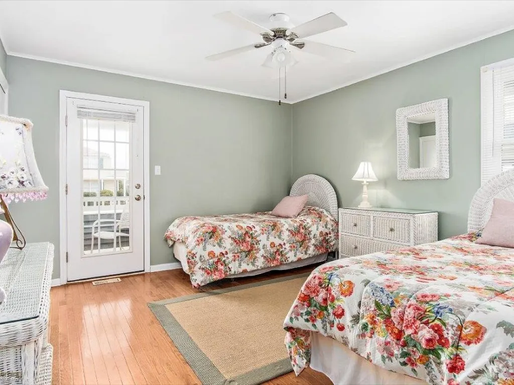 First floor bedroom with shared front deck