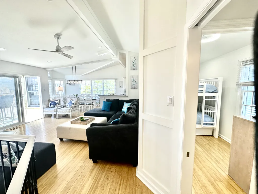 View into living room and upstairs bunk room #4