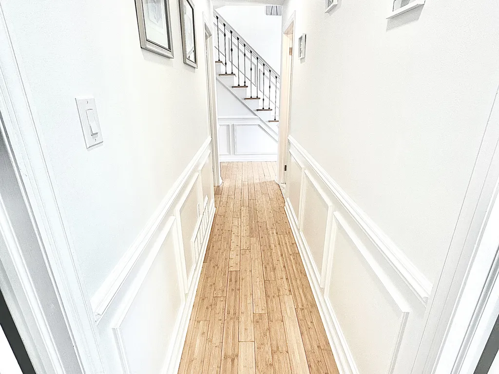 hall way with bedrooms 3 of 4 bedrooms on lower level