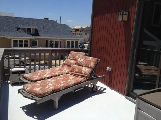 Relax In Our Teak Lounges while looking at the Ocean from our 2n