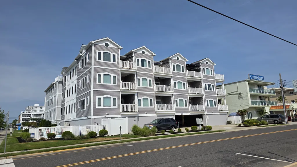 Top Left Unit of Building From Park Across Street