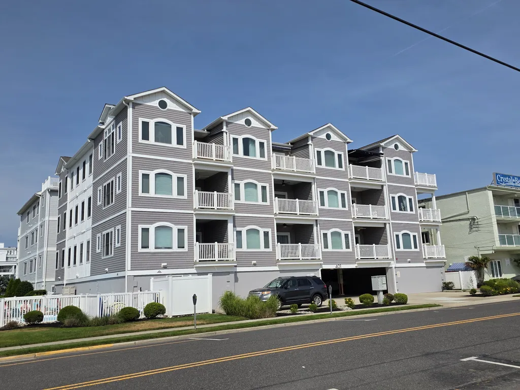 Top Left Unit of Building From Park Across Street